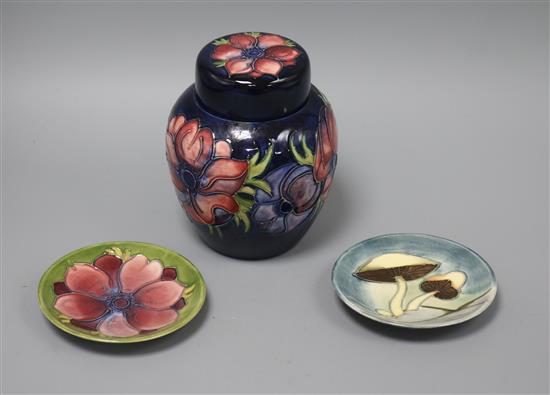A Moorcroft Anemone pattern ginger jar and cover and two pin dishes, H 16cm (jar)